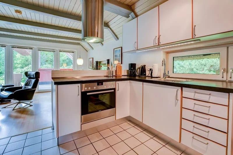 Child-friendly thatched cottage on a large plot. Natural property from private