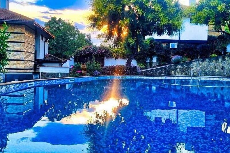 A dream vacation in a villa with a huge pool.