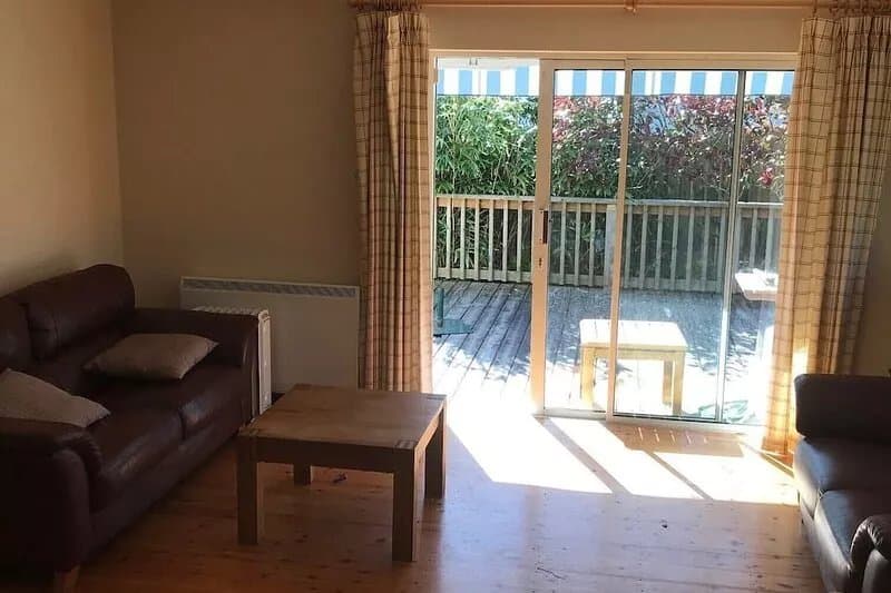 Brittas Bay. Detached house with large deck and garden sleeps six