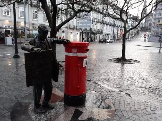 The Newspaper Vendor Statue
