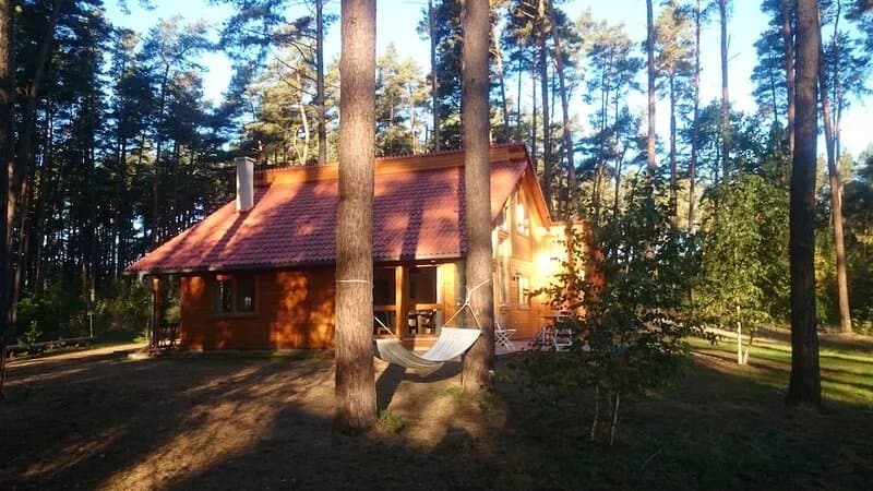Stylish, bright wooden house by the forest in the immediate vicinity of a clear