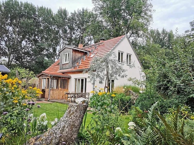 Cozy cottage in a fantastic location right on the river with a beautiful garden