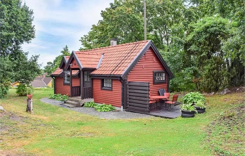 Small cozy cottage with terrace on a beautiful plot.