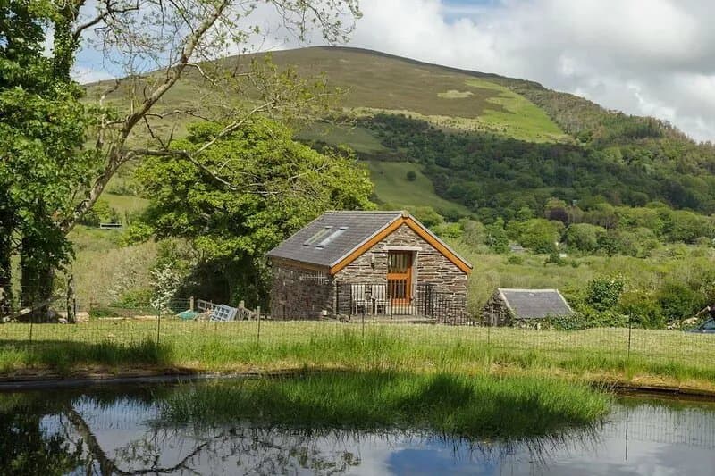 A delightful one-bedroomed holiday cottage located on a farm, nestled into the
