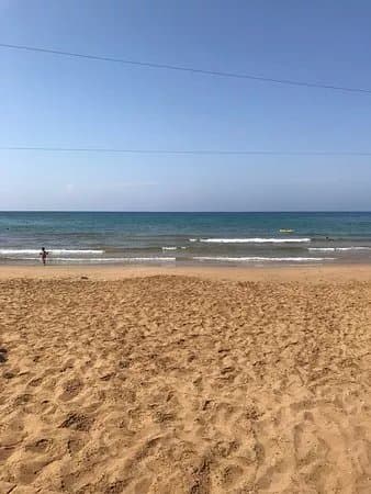 Kaplica on a Sandy Beach