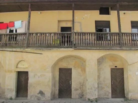 Skoumally House