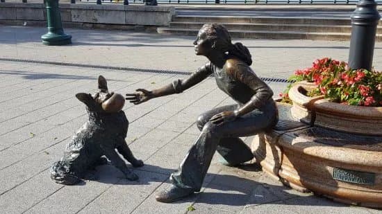 Girl With Her Dog Statue