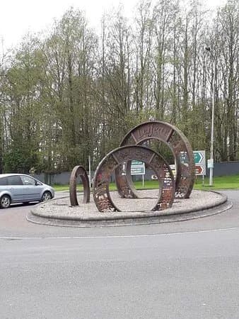 The Three Coins Sculpture