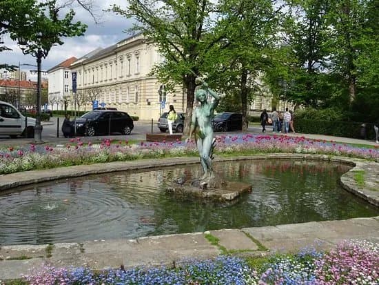 A Girl with the Horn of Plenty Statue