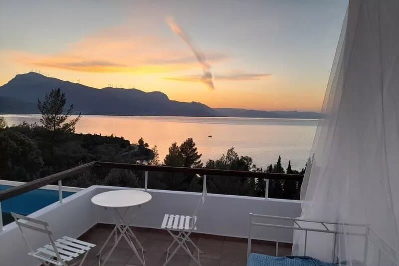 A modern villa in a unique setting with stunning views. The real Greece.