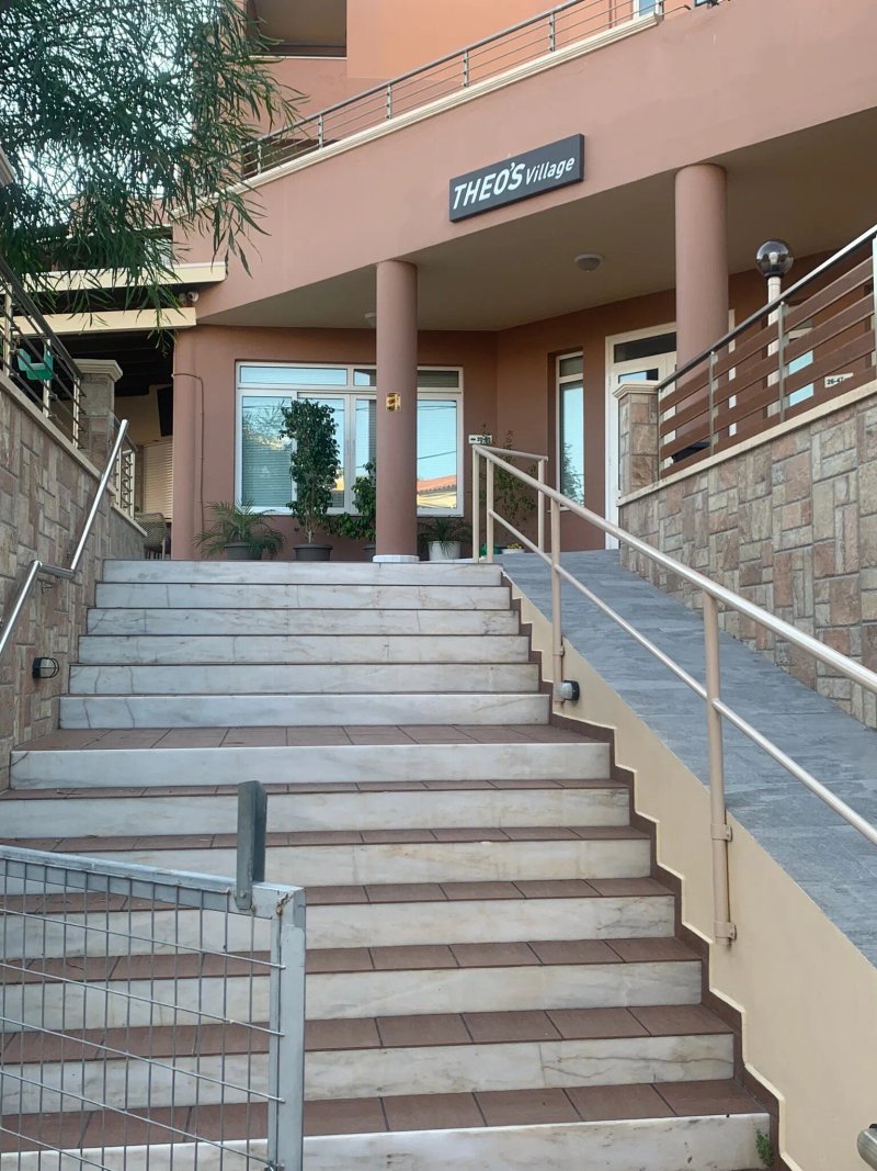 Theos Village Hotel & Apartments