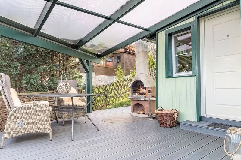 Holiday home with terrace next to the forest