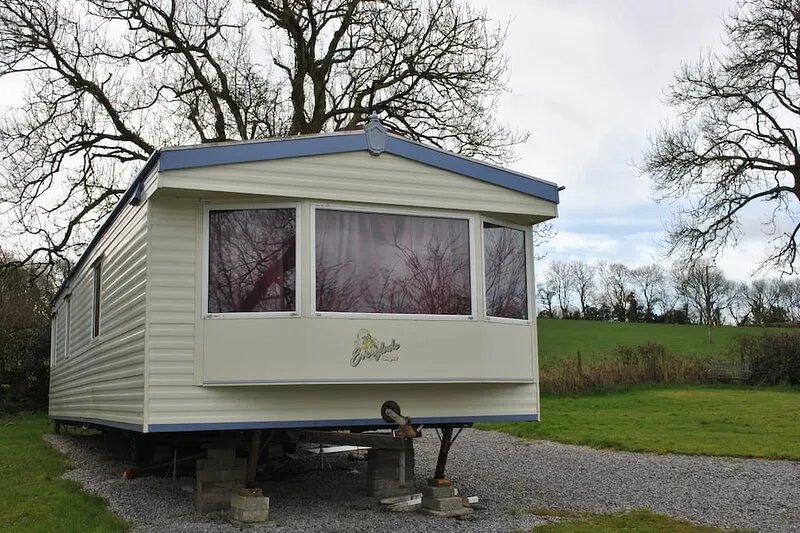 Five minute drive to the beach. Own large garden. Parking with your own access.