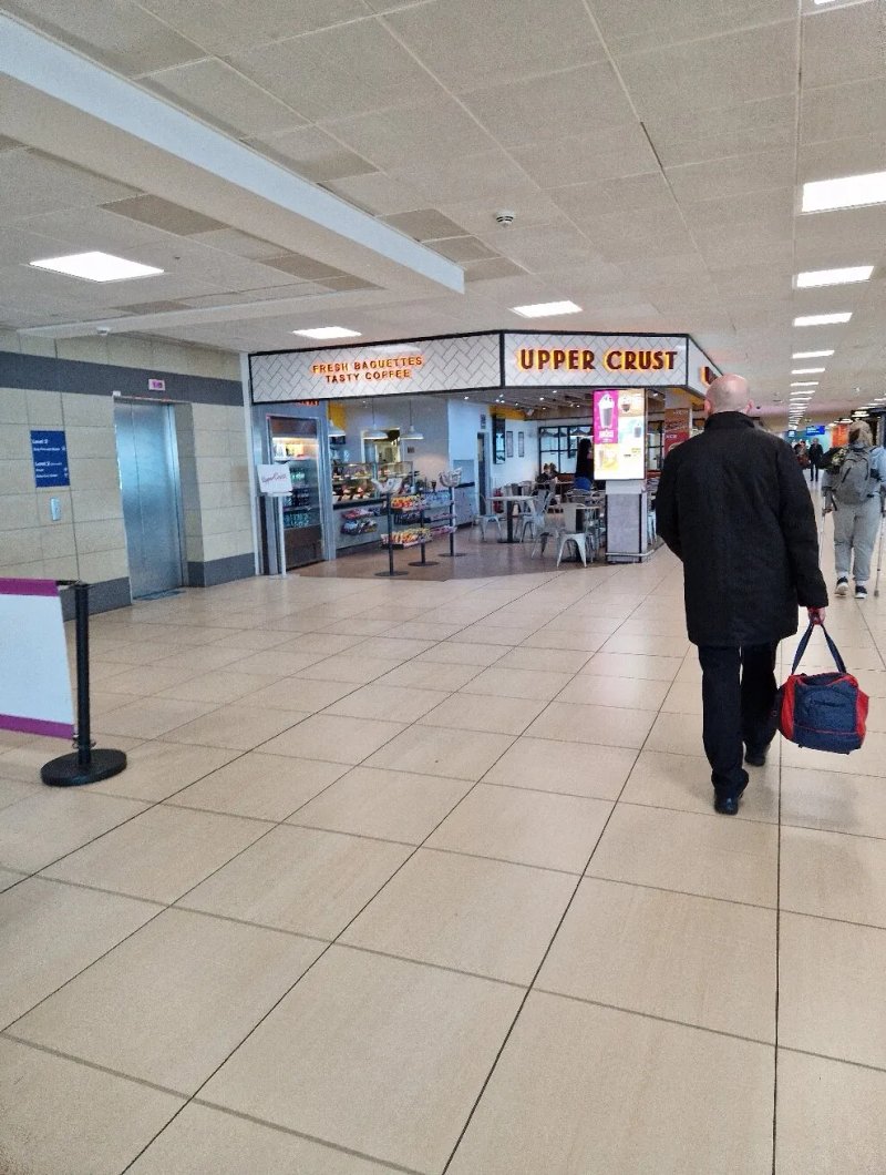 Upper Crust John Lennon Airport