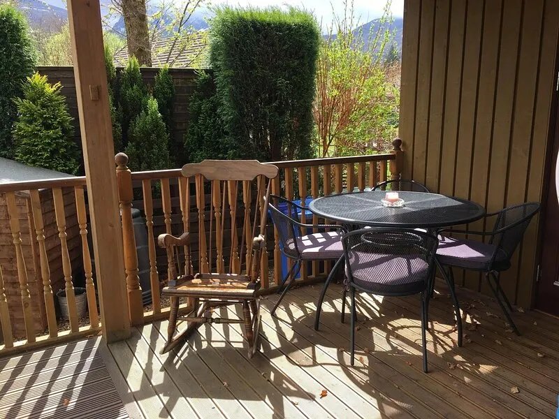 Burnside Lodge, overlooking river Lundy, backdrop of Ben Nevis and Nevis Range.