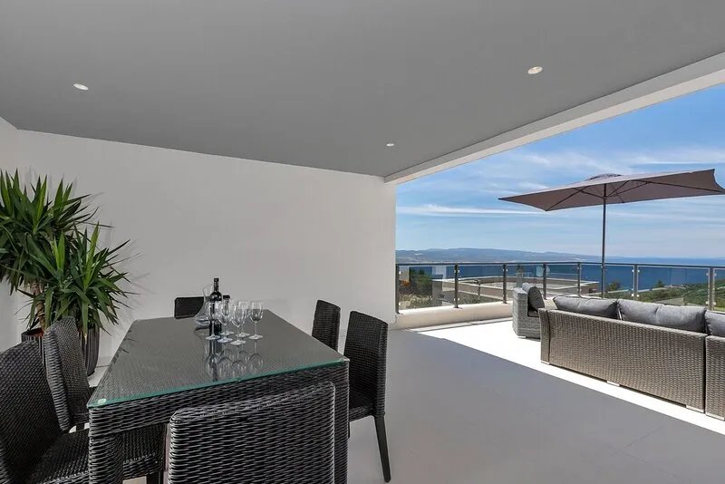 Modern holiday home with infinity pool, three bedrooms, terrace, sea view