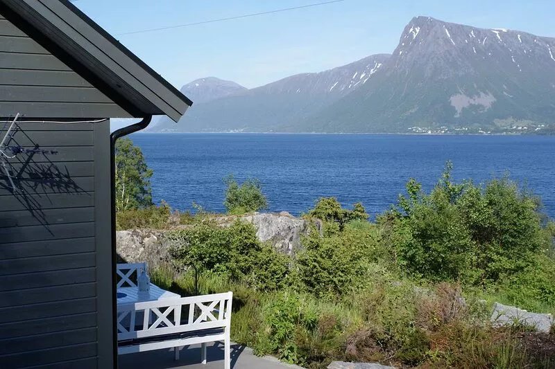 Holiday home with view plot beyond Fjord and mountains.