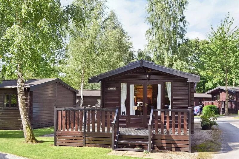 Luxury pine log cabin situated in landscaped grounds with panoramic views of