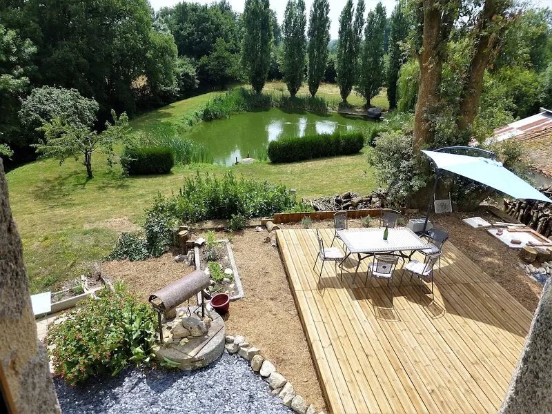 Luxury holiday home escape, set in an acre of private garden with its own lake