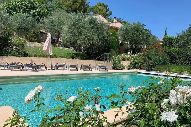 Self-catered villa with private pool in a flowery garden with trees