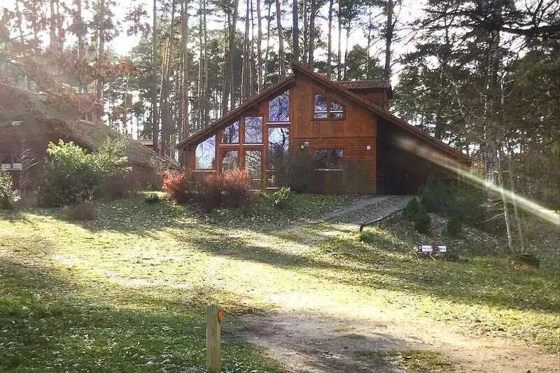 Your house on the lake with a fireplace, sauna and bathing area nearby!