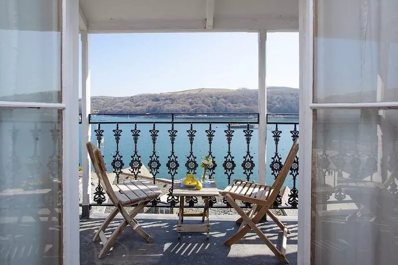 Relax on the balcony and watch the boats sail by.