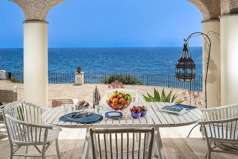 Waterfront villa with panoramic terrace and garden