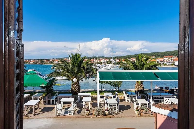 On The Water!  Awesome Views.  Sleeps 6.  Family Friendly. Terrace & Courtyard.