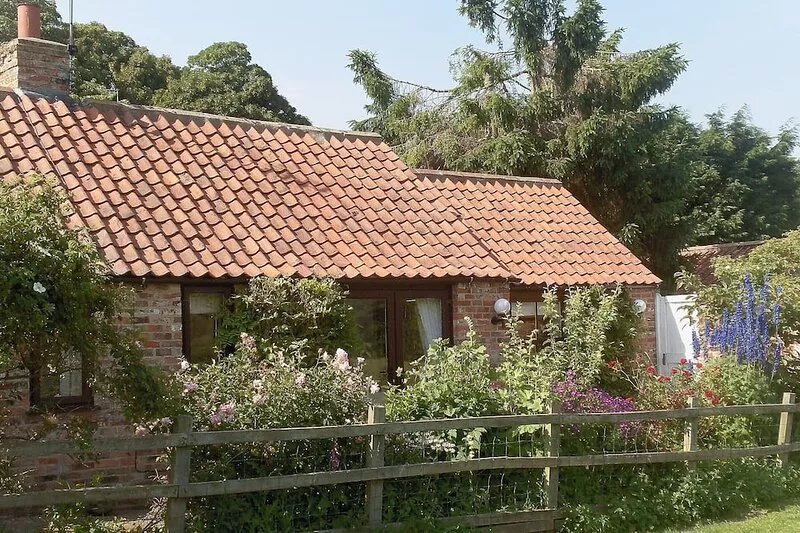 Wisteria Cottage is a lovely romantic retreat, with open fire in the living
