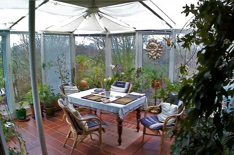 Room with balcony and garden