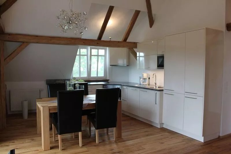 Exclusively and high-quality equipped ***** apartment with large garden