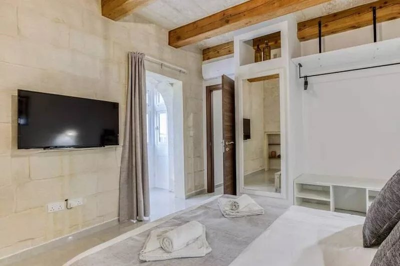 A lovely 1BR home with Balcony off the coast.