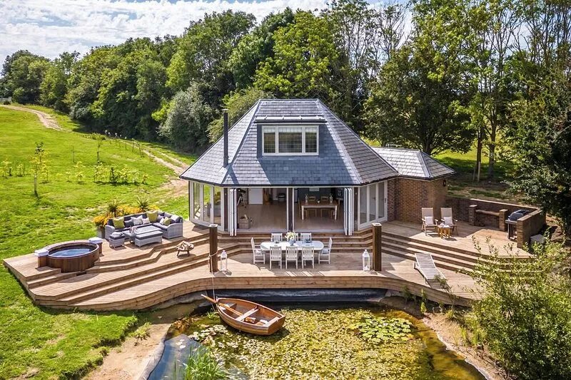 Luxury Boathouse situated on a private lake, with panoramic views and a hot tub.