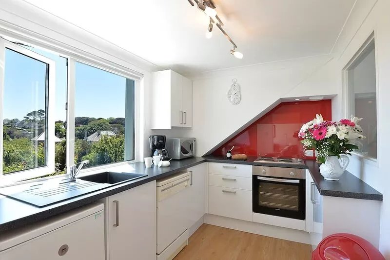 A first floor apartment offering panoramic views of Falmouth Bay and out to sea.