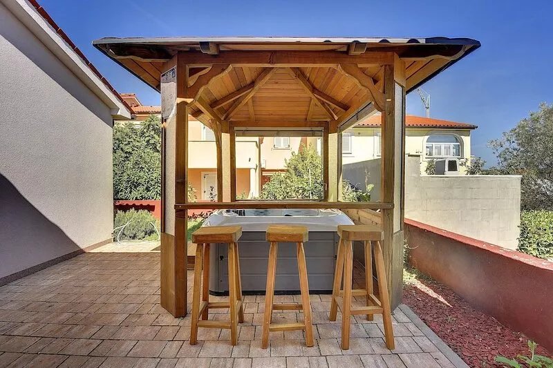 Holiday home with terrace and outdoor kitchen