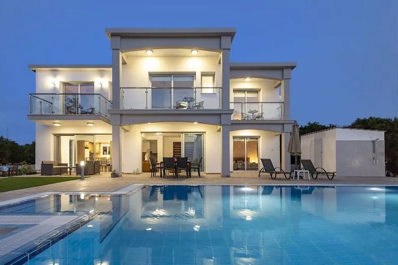 Villa Ammoyiali on the Beach -  a large modern villa that sleeps 8 guests in 4