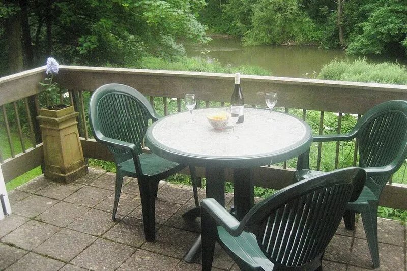 Situated by the banks of a river with private fishing just yards away.
