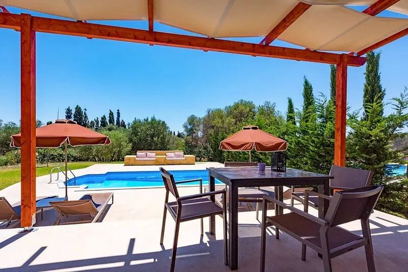 Relax at Villa Rhea, just a short walk from the beautiful Ai Helis Beach