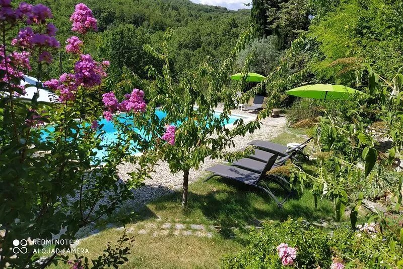 Charming detached house with terrace in a farmhouse with swimming pool and