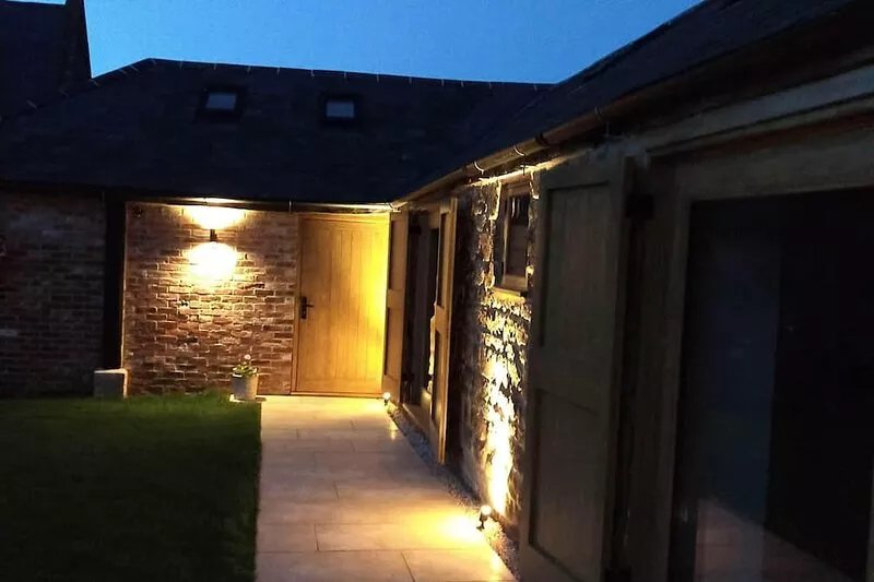 Luxury Barn conversion in village farm setting.