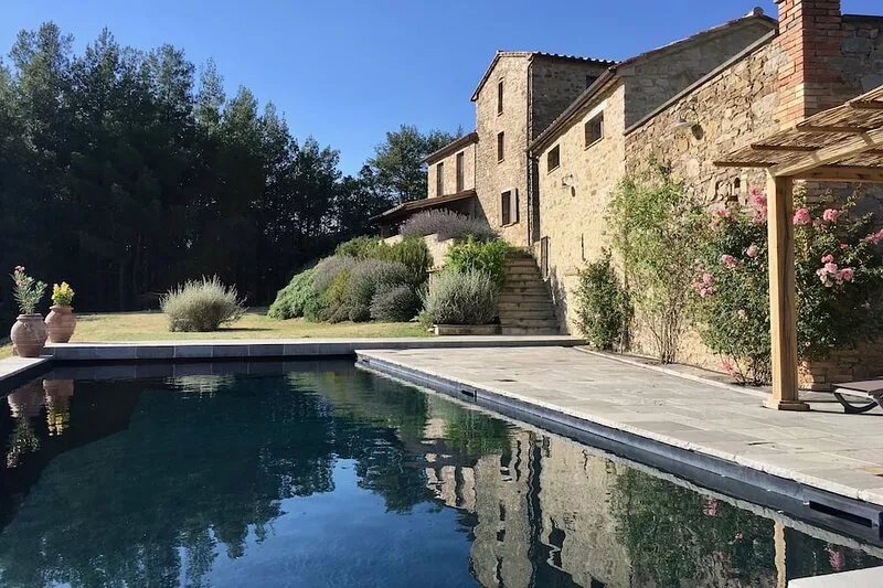 Stunning hilltop villa with amazing views, pool, olive grove, vines and woods.