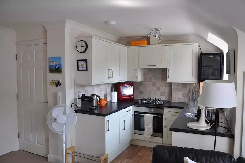 A lovely quiet new flat 50 yards from the beach in the centre, parking included.