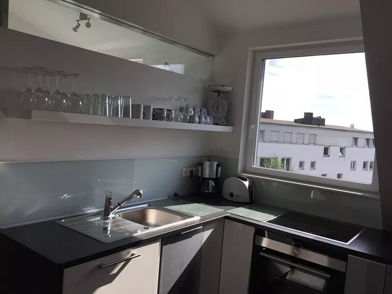 Modern, bright apartment near the train station