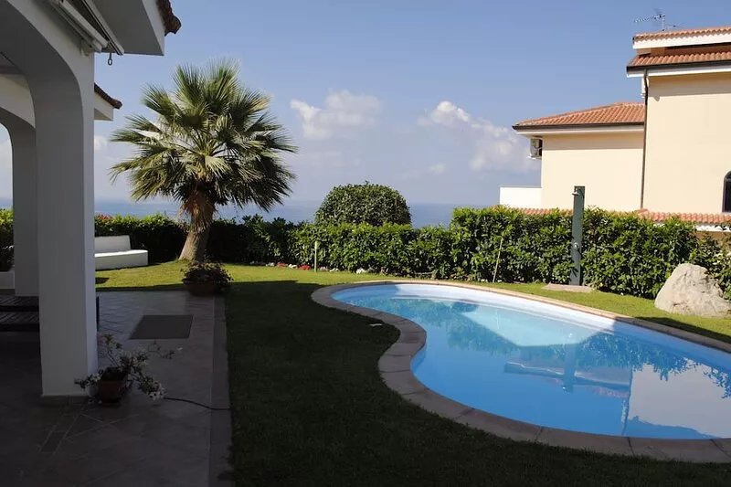 Villa with private pool terrace overlooking the sea, village and beach nearby