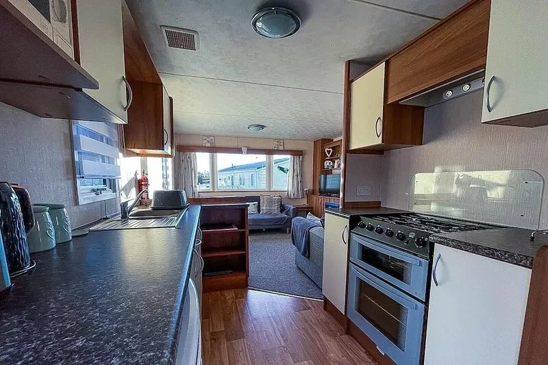 Beautiful 6 berth caravan for hire with huge decking at Manor Park ref 23142K