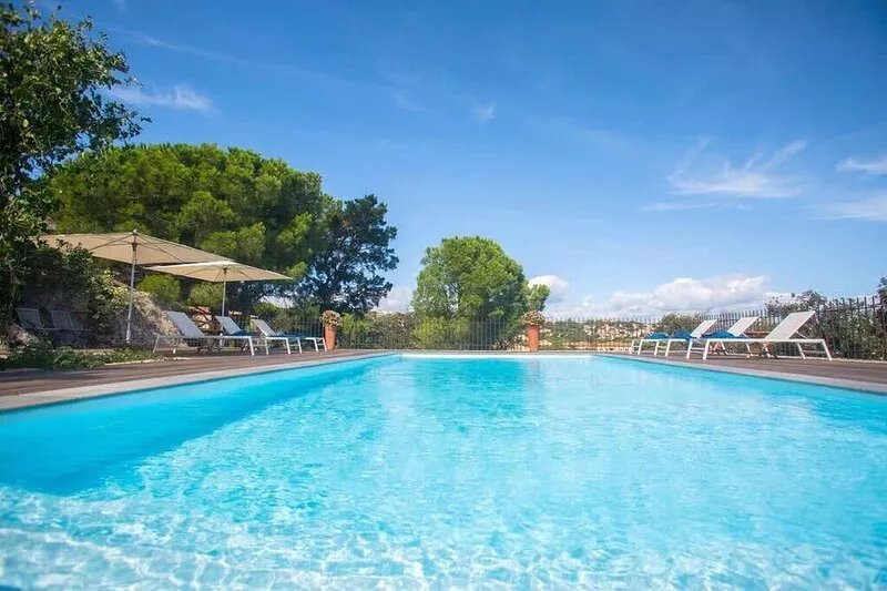 Villa in Calvi with warmed swimming pool, garden,  sea view near the beach.