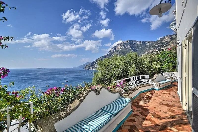 Villa Cleopatra is an elegant and welcoming two-story villa built sheer above t
