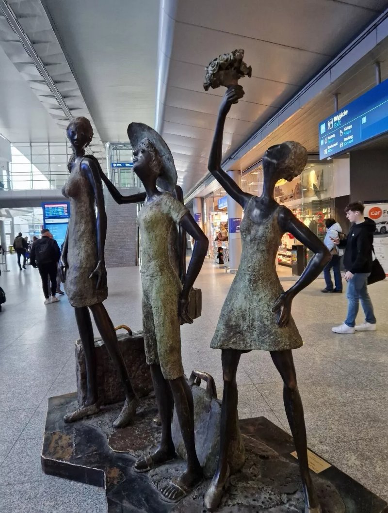 A Scene From Airport Life Statue