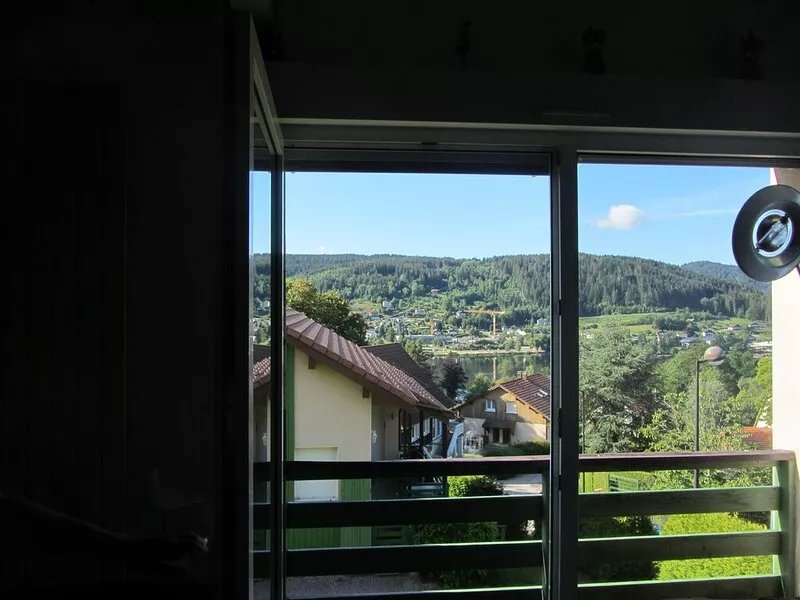 6-bed duplex apartment with lake view. Terrace and outdoor pool.