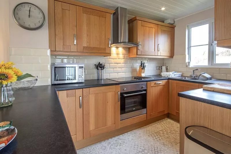 A new england lakeside lodge that sleeps 6 guests  in 3 bedrooms